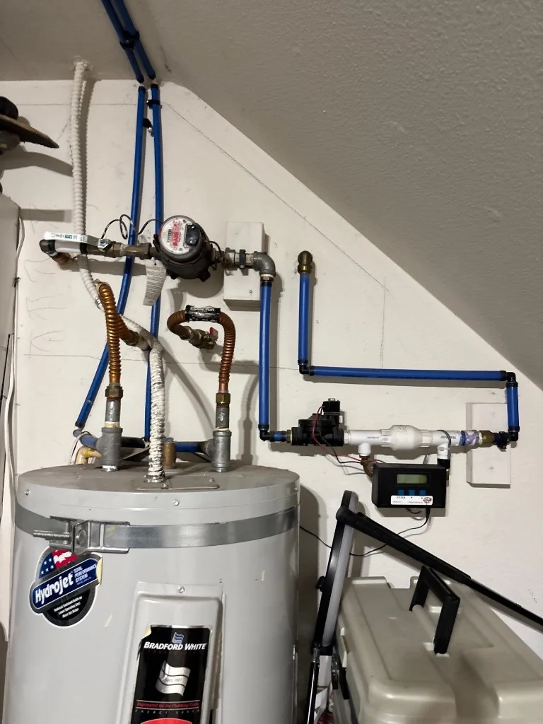 Water heater connections and finished pipework